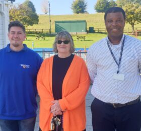 Ryan Widdows (Cafe Manager), Judith Halls (Deputy Town Clerk) and PCSO Roland Revers